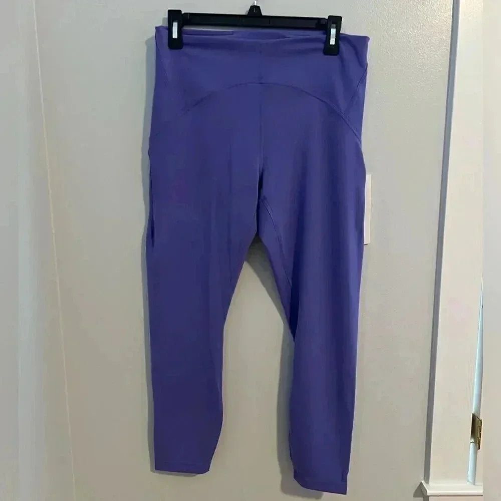 New with tags Lululemon Purple Instill HR Tight 25”